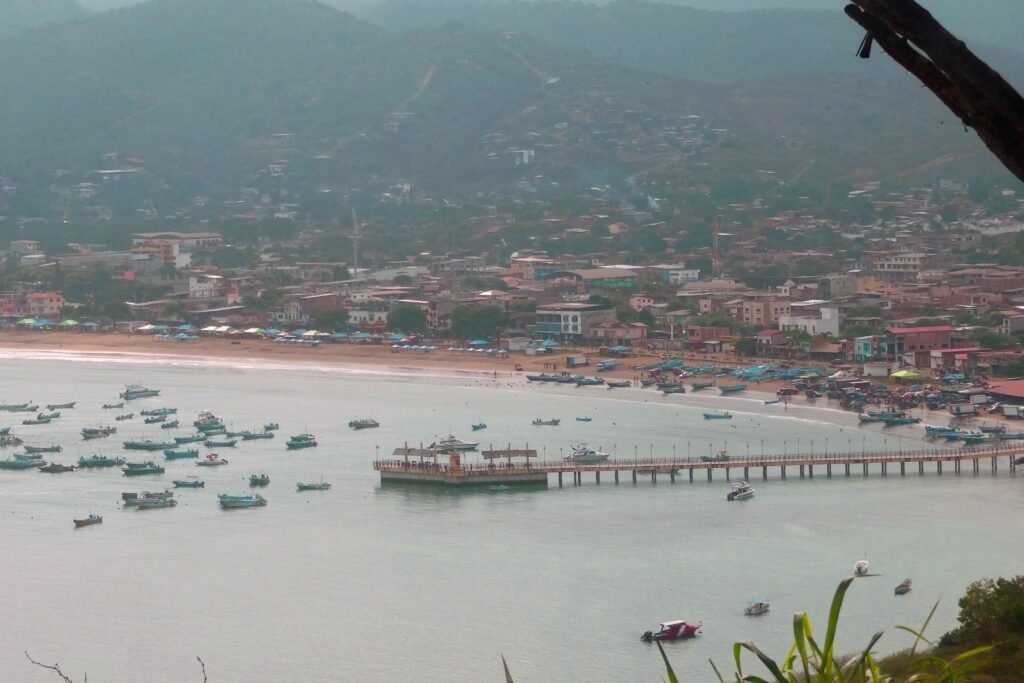 Small boats surround a pier on Isla Salango, near Guayaquil Ecuador
