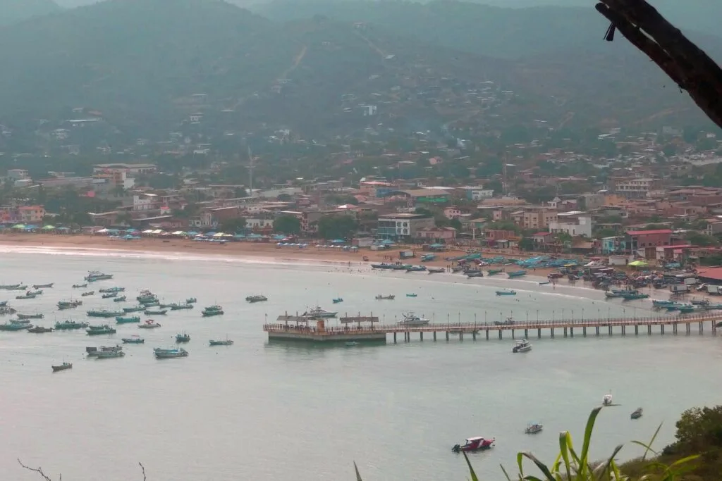 Small boats surround a pier on Isla Salango, near Guayaquil Ecuador