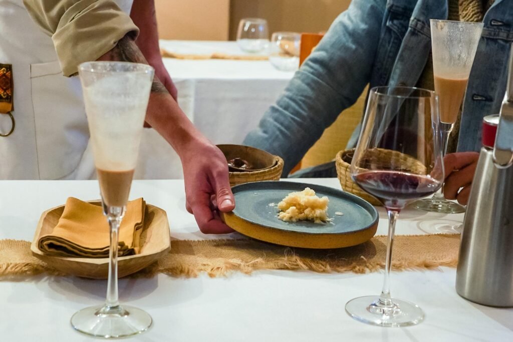 A fancy plate of food and wine, based on Amazonian ingredients in Quito, Ecuador