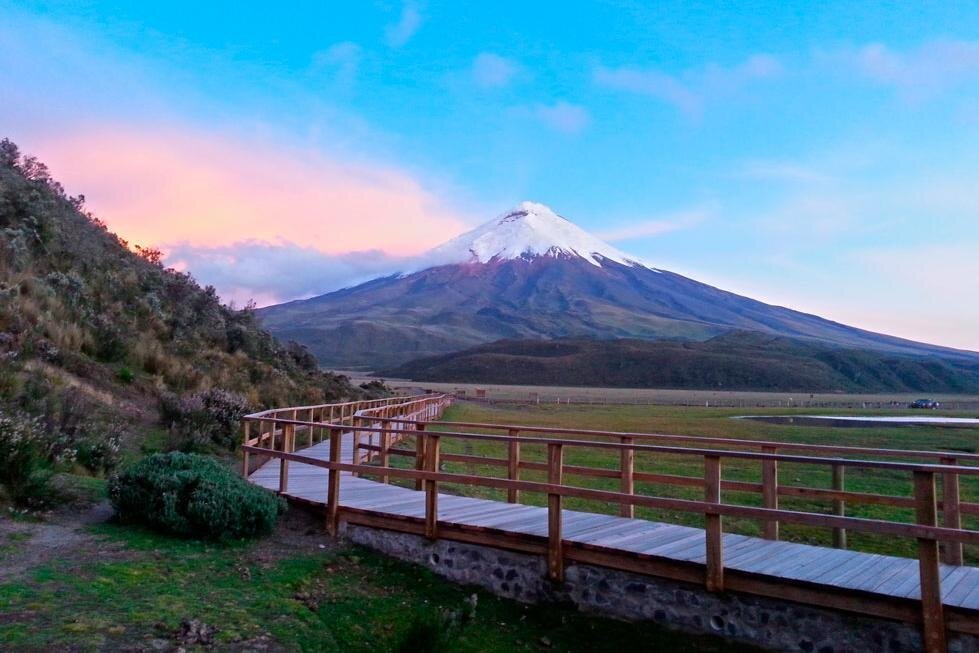 Clouds tumble over Volcán Cotopaxi at sunset in Ecuador