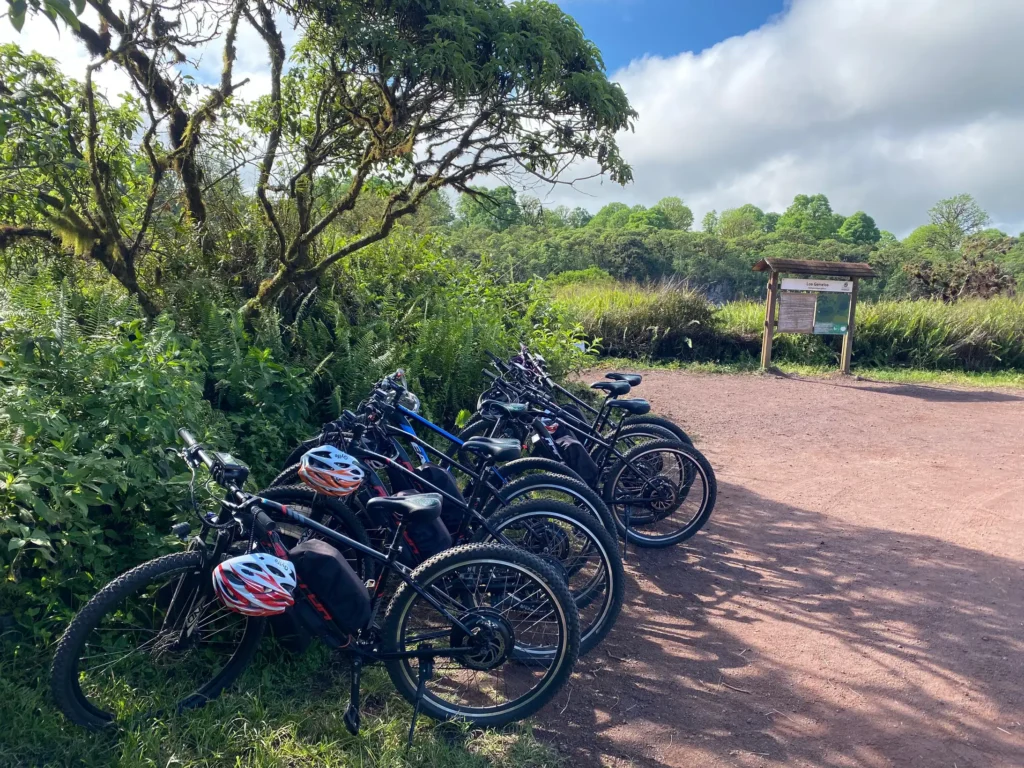 A row of bikes are parked along a track on Isla Isabela, Galápagos