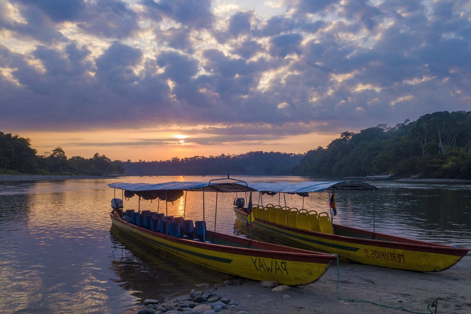 A riverboat at sunset in the Amazon, Ecuador