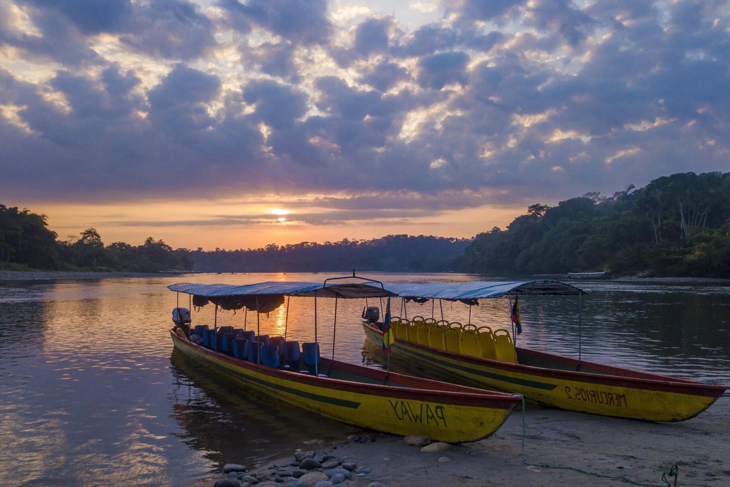 A riverboat at sunset in the Amazon, Ecuador