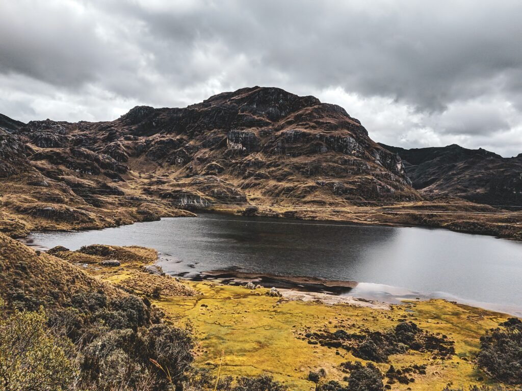 A wide view of the main lake surrounded by paramo in Cajas National Park, near Cuenca, Ecuador