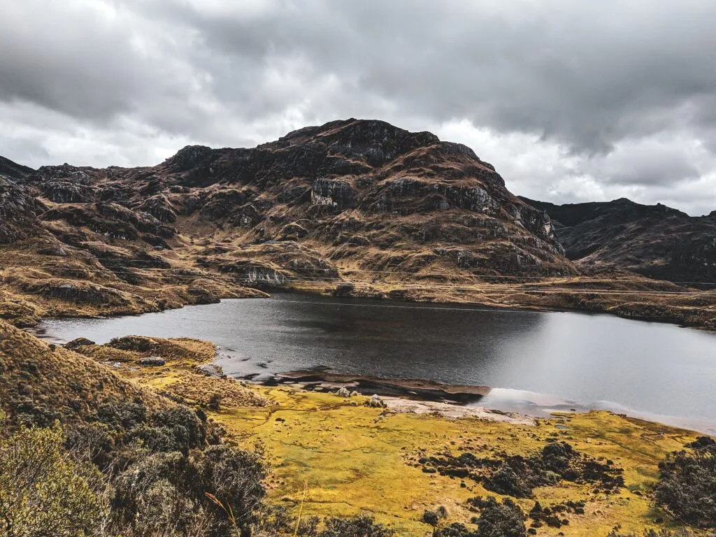 A wide view of the main lake surrounded by paramo in Cajas National Park, near Cuenca, Ecuador