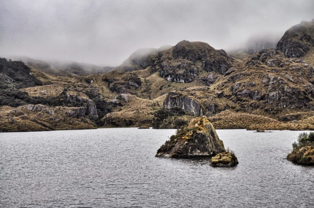 A wide view of the main lake surrounded by paramo in Cajas National Park, near Cuenca, Ecuador