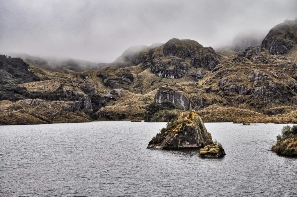 A wide view of the main lake surrounded by paramo in Cajas National Park, near Cuenca, Ecuador