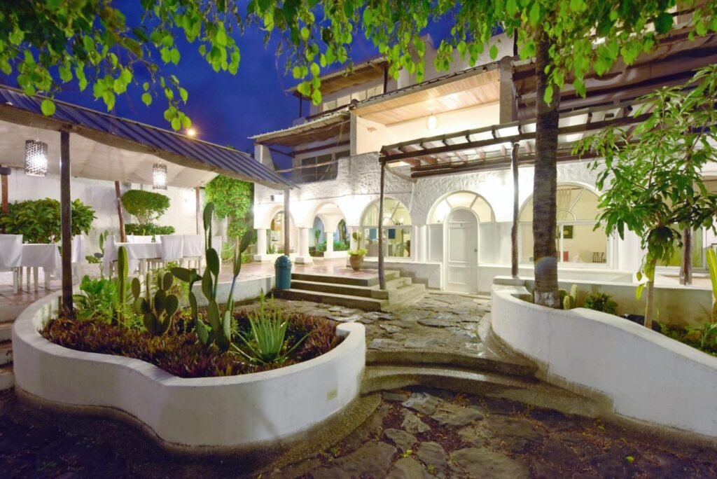 The entrance to the whitewahed Casa Opuntia Hotel in Puerto Baquerizo Moreno, San Cristobal, Galapagos, Ecuador