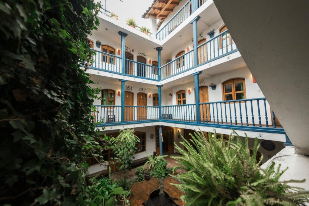 The white Spanish colonial courtyard of Hotel Doña Esther, near Cotocachi, Otavalo, Ecuador