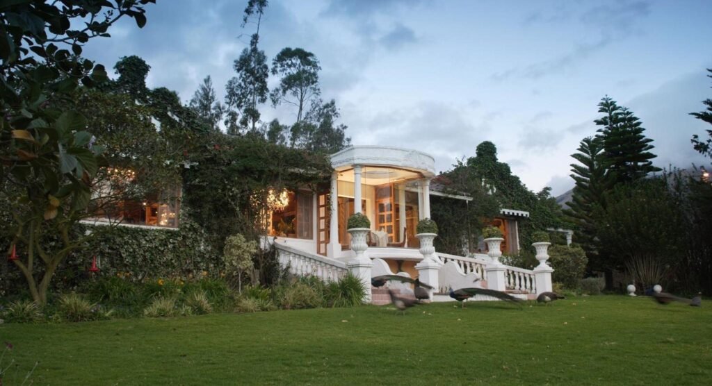 La Mirage Garden Hotel & Spa sits on top of a hill at dusk near Cotocachi, Ecuador