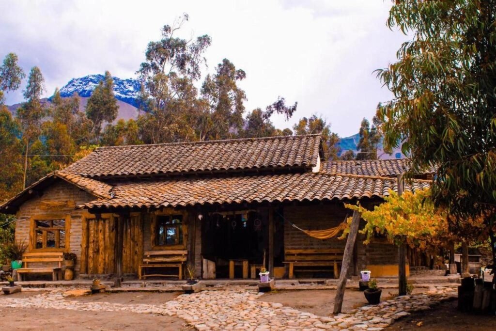 A small lodge with a huge volcano behind it near Volcan Imbabura, Otavalo, Cotocachi, Ecuador
