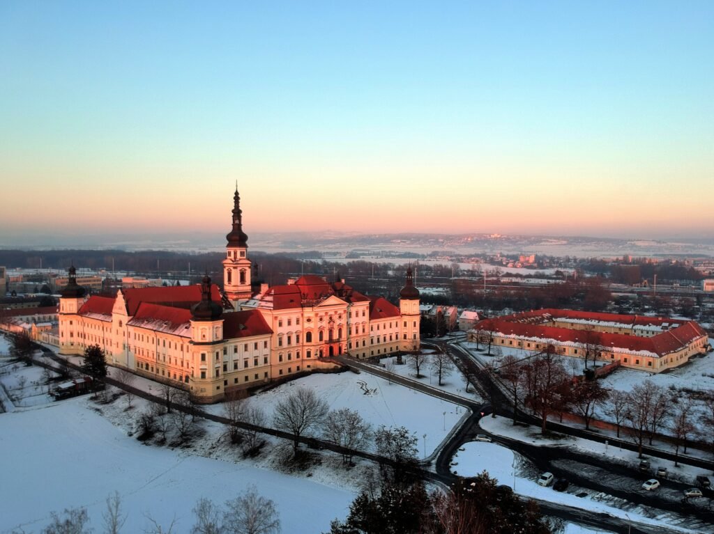 The Archbishop's Palace is covered in snow at sun set in Olomouc, Czechia