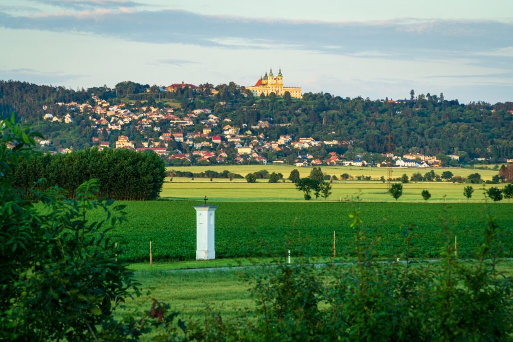The Archbishop's Palace is seen through the fields from a distance in Olomouc, Czechia